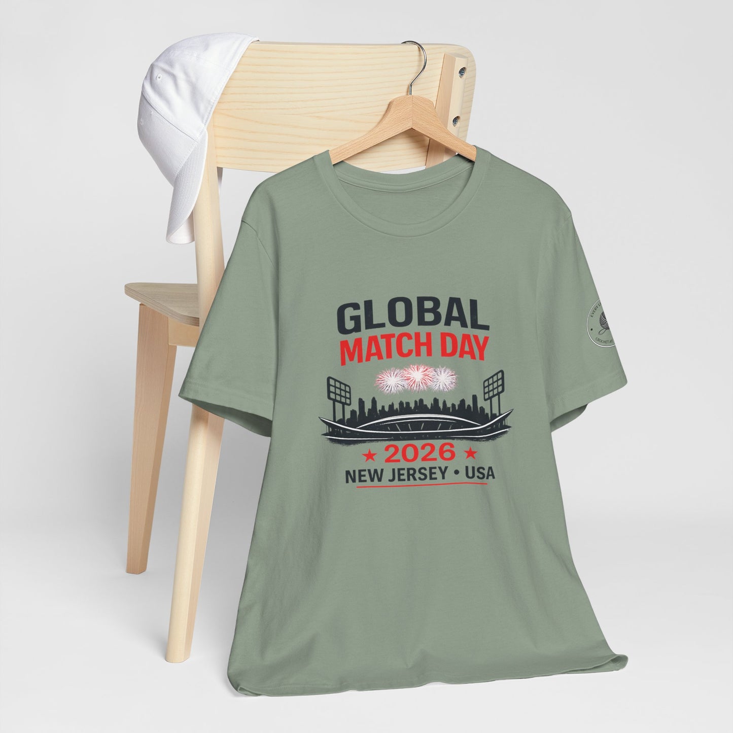 New Jersey 2026 match day tee, model layered with jacket